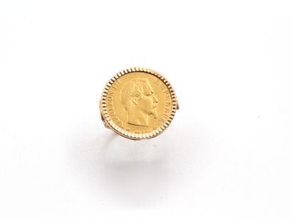null Ring in yellow gold 750 thousandths decorated in the center of a 10 Francs gold...