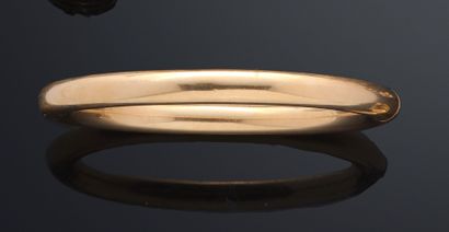 Bracelet rigid and opening in yellow gold...