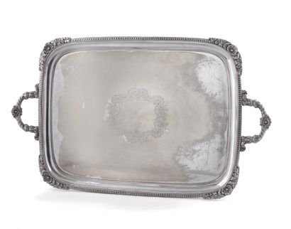 null Silver plated serving tray of rectangular shape with handles, underlined by...