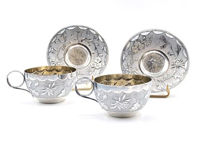 Two cups and under cups in silver 800 thousandths,...