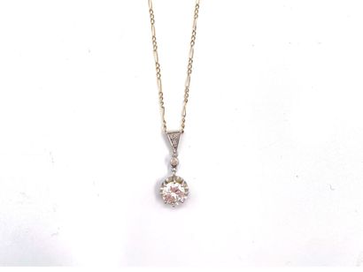 null Necklace articulated in white gold 750 thousandths holding in pendant a round...