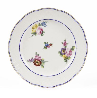 null Sèvres

Assiette à osier en porcelaine tendre à motifs en relief de vannerie...