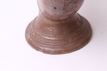 null Ringed goblet on foot out of salted brown stoneware with engraved decoration...
