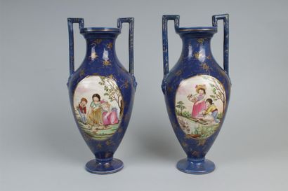 null ITALY

Pair of earthenware vases of baluster form with polychrome decoration...