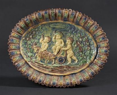 null SUITE DE PALISSY. 

Oval dish in glazed earth with polychrome decoration and...