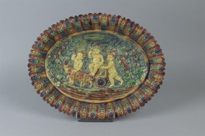 null SUITE DE PALISSY. 

Oval dish in glazed earth with polychrome decoration and...