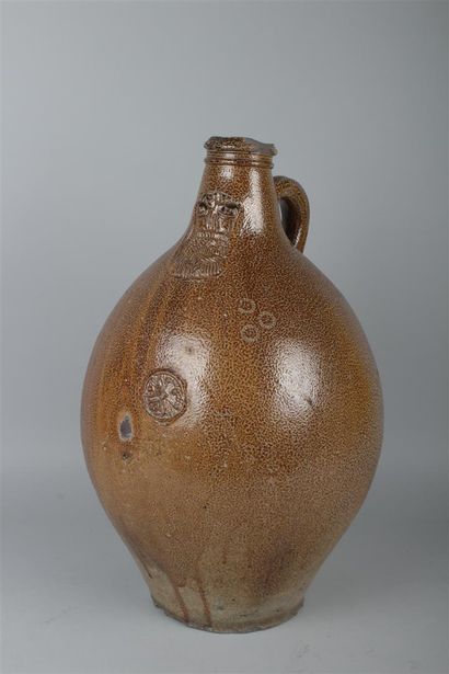 null RAEREN

Large pitcher in stoneware called bartmann decorated with a mask of...