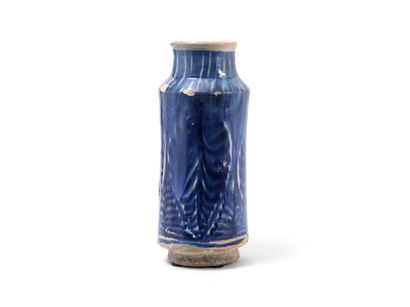 null SPAIN

Large cylindrical earthenware albarello decorated with stylized palmettes...