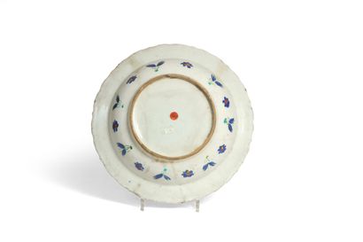 null IZNIK

Round dish with contoured edge in siliceous ceramic with lead glaze with...