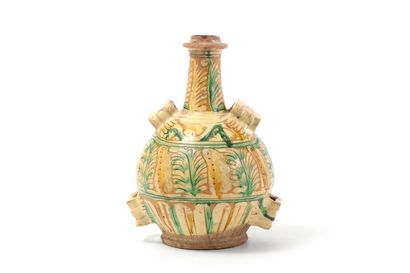 null VENETIA

Glazed earthenware flask in the shape of a bottle with four loops with...