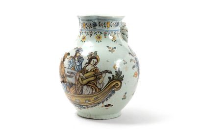 null TALAVERA

Large earthenware ovoid pitcher with polychrome decoration of a concert...
