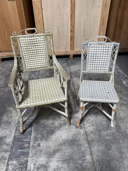 null Set of an armchair and a garden chair mismatched wood and woven wicker polychrome....