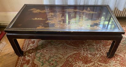 null CHINA

Coffee table in black lacquered wood with gold decoration of pagodas...
