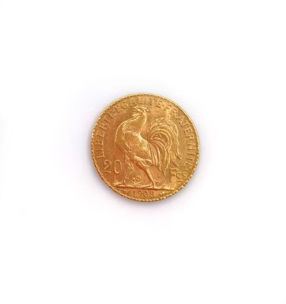 null Une pièce de 20 francs or, Coq, 1908. 

Poids : 6,3 g.