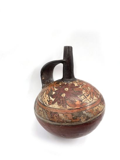null VASE with globular body with a handle out of polychrome terra cotta with decoration...
