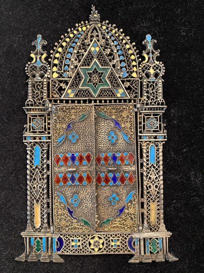 null Binding ornament in enamelled silver with architectural decoration.

Gross weight...