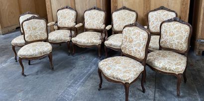 null Set of four armchairs and four chairs in natural wood molded and carved with...
