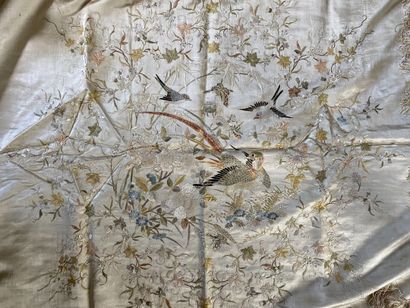null CHINA

Large cream silk shawl with embroidered decoration of birds and flowers,...