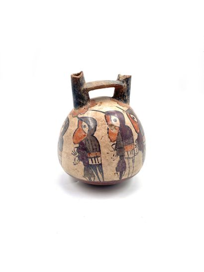 null Vase stirrup out of terra cotta with polychrome decoration of birds in flight....