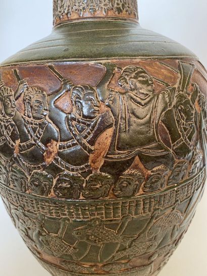 null VIETNAM

A baluster-shaped vase with olive and brown enamel decoration of rowers...