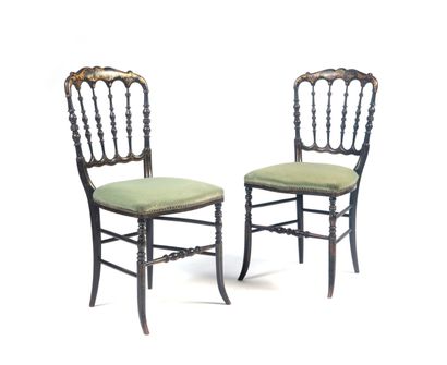 null Pair of chairs with bars in blackened wood with gilded scrolls.

Napoleon III...