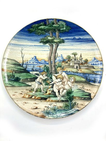null In the style of Urbino

Earthenware dish decorated with putti in a landscape....
