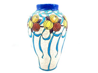 null BOCH 

Earthenware ovoid vase with cracked white cover and decoration of fruits...
