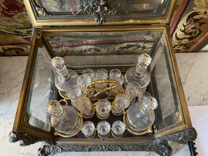 null LIQUEUR CELLAR in chased and gilded bronze and glass, the amounts with decoration...
