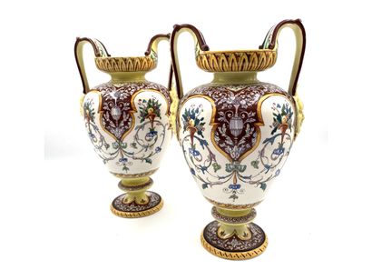 null SARREGUEMINES 

Paire de vases amphore à deux anses à décor polychrome d'entrelacs...