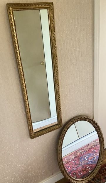 null TWO MIRRORS in wood and gilded stucco, one rectangular (105 x 33 cm), the other...
