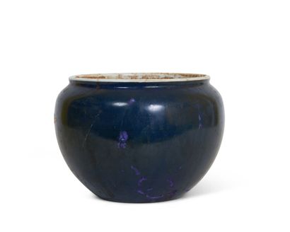 null CHINE

Vase en porcelaine à couverte bleue. Porte une marque sous la base. 

Haut....