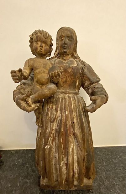 null Vierge à l'enfant

Fort relief en bois avec traces de polychromie.

XVIIIe siècle

Haut....
