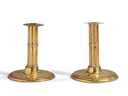 null Pair of torches called "à la financière" standing on a round base with engraved...