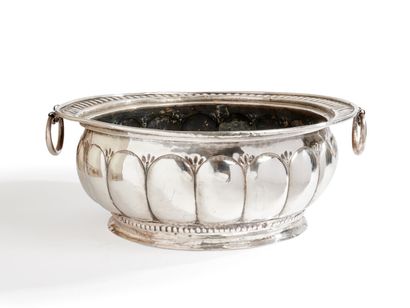 null Copper basin embossed and silvered, of circular form, with decoration in relief...