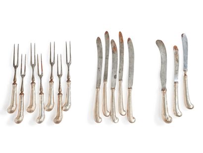 Seven forks, handles in silver with a gadrooned...