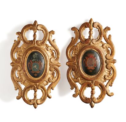 null Pair of decorative elements in gilded wood with openwork decoration of foliage...