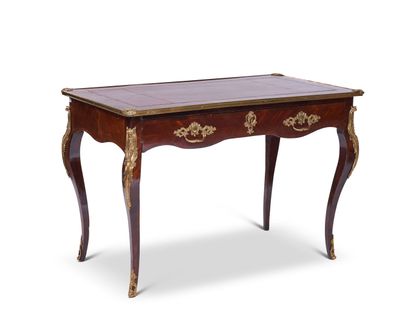 null Veneer desk opening to a drawer in the belt and resting on curved legs, the...