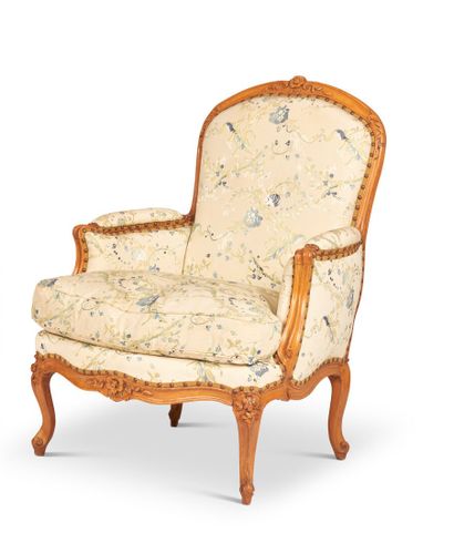 null Large molded and carved beechwood armchair with high flat back and decoration...