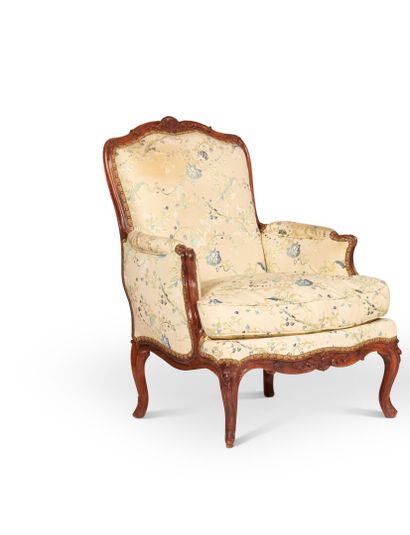 null A molded, carved and stained wood shepherd's chair, with a flat back decorated...