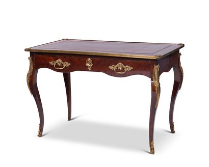 null Veneer desk opening to a drawer in the belt and resting on curved legs, the...