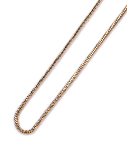 null NECKLACE articulated in yellow gold 750 thousandths, the interlaced links.
(Accidents).
Length:...