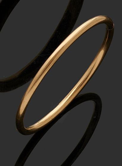 null BRACELET in yellow gold 750 thousandth, rigid and opening.
Interior diameter:...