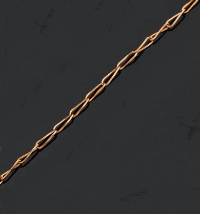 null NECKLACE articulated in yellow gold 750 thousandths, the lengthened and openwork...