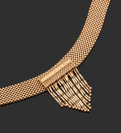 null NECKLACE articulated in yellow gold 750 thousandths, the center decorated with...