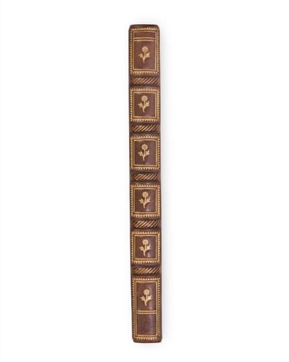 null BINDING of the XXth century. In-16, brown calfskin, 18th century decoration...