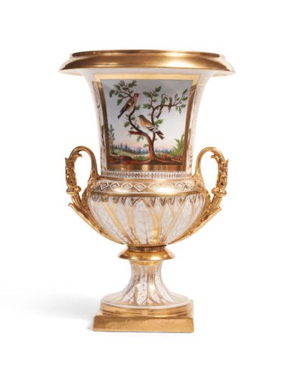 null Paris or Limoges
Porcelain vase of baluster form, with a handle with a gold...