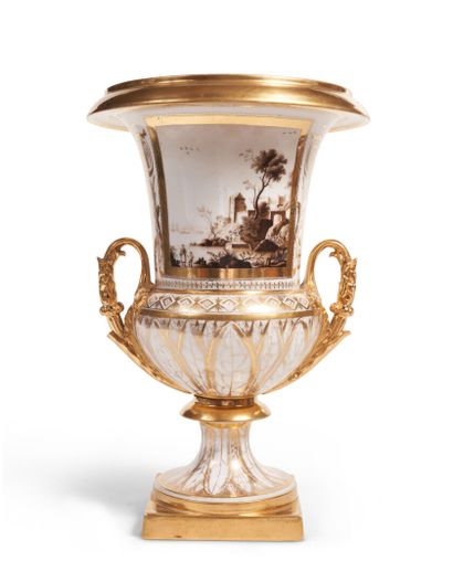 null Paris or Limoges
Porcelain vase of baluster form, with a handle with a gold...