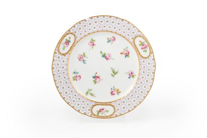 null Sevres
Three plates in soft porcelain with polychrome decoration in the center...