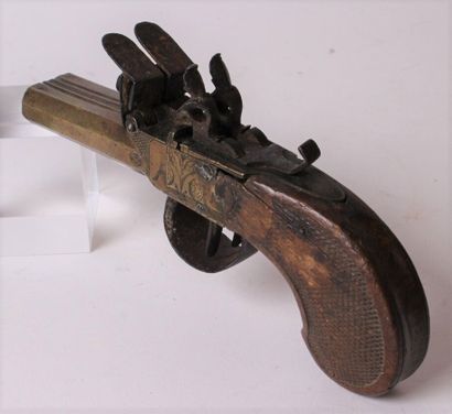 null Percussion pistol, the iron lock with chased decoration of foliage, the stick...