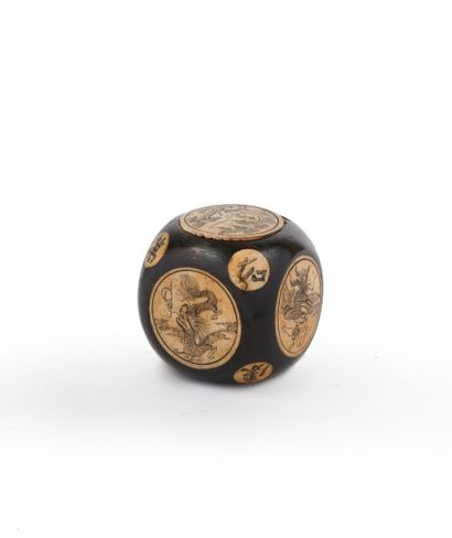 null CHINA

Carved wood and bone dice decorated with dragons and characters in medallions....